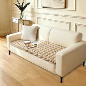 CoSofSLIP pet-friendly couch protector keeps fur and spills away from upholstery.