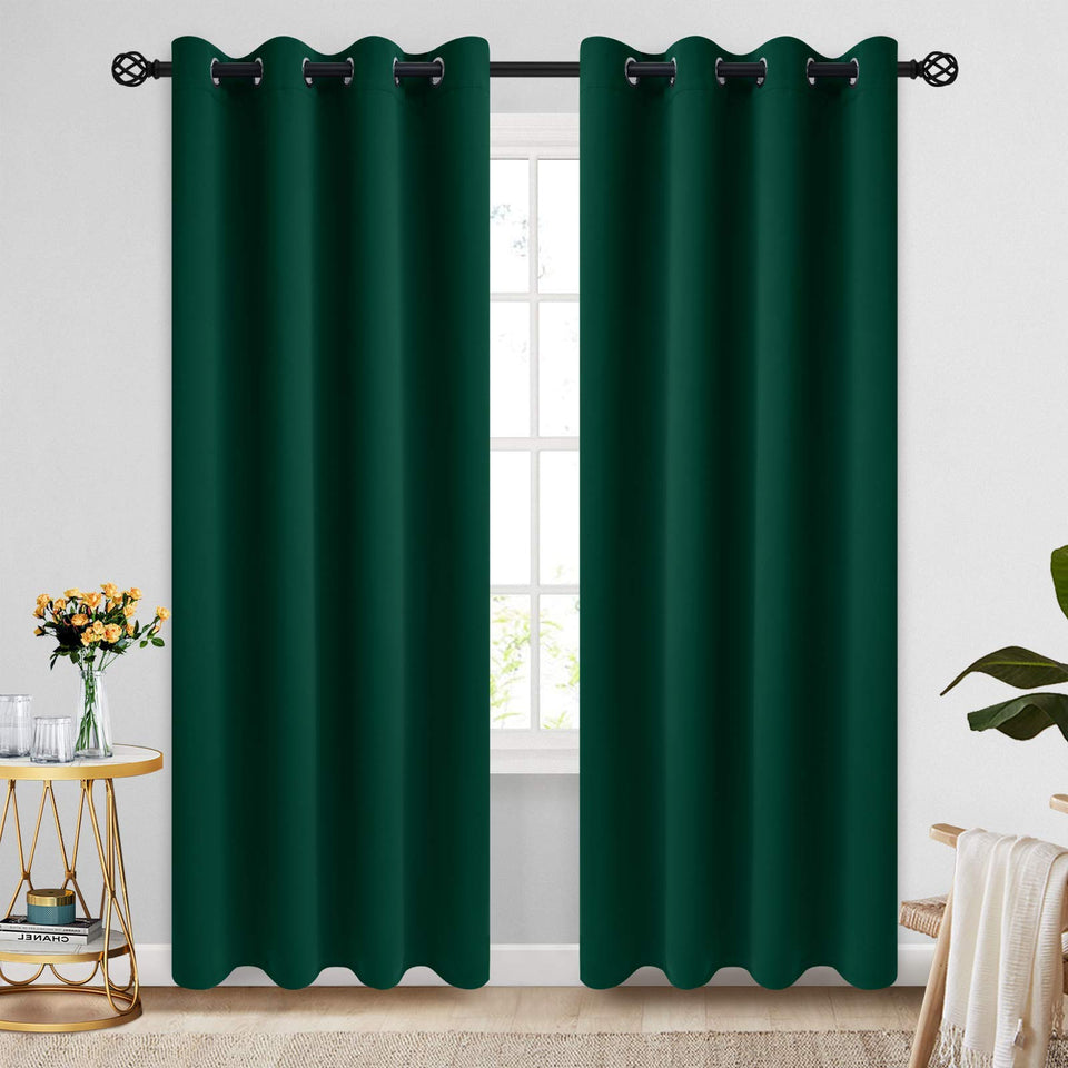 Cosviya grommet blackout curtains full panel setup blocks daylight and adds privacy.