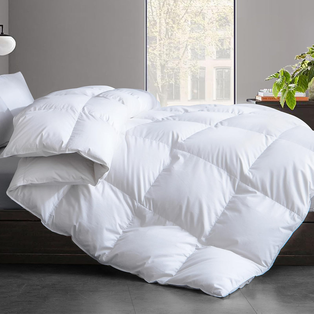 Cosybay comforter close-up shows plush feather-down fibers for all-season warmth.