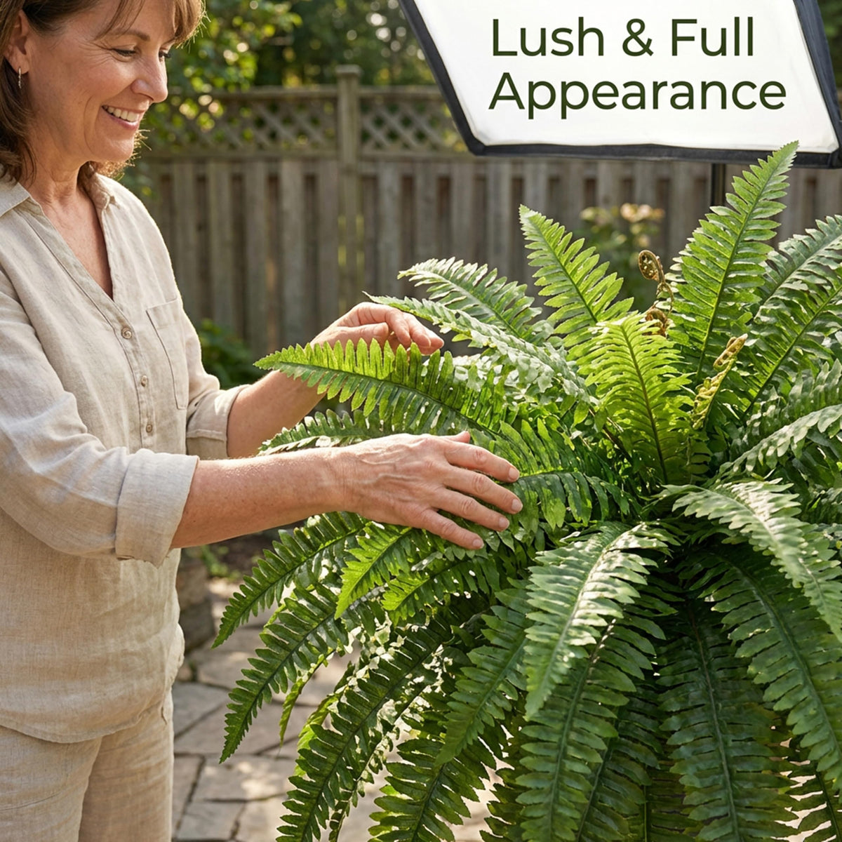 Cotlux waterproof fake fern withstands outdoor splashes for patio use.