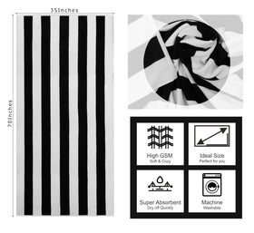 COTTON CRAFT Cabana Stripe Beach Towel poolside laid flat for sunbathing.