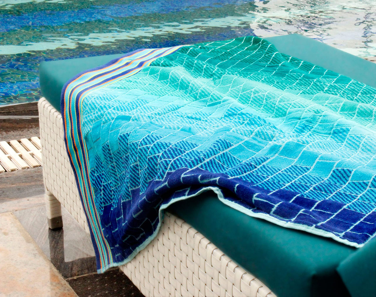 Cotton Craft large 39x68 inch towel provides generous coverage for sunbathing