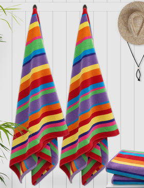 COTTON CRAFT Summer of Siam velour finish towel at poolside.