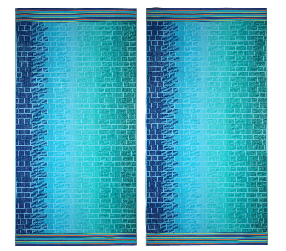 Cotton Craft oversized two-pack beach towels with plush velour for lounging