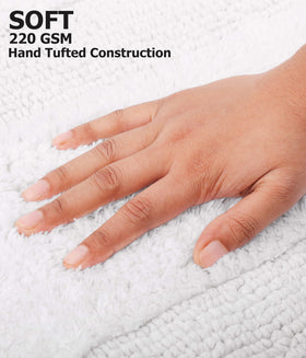 Cotton Craft white reversible rug set, quick absorption after showers.