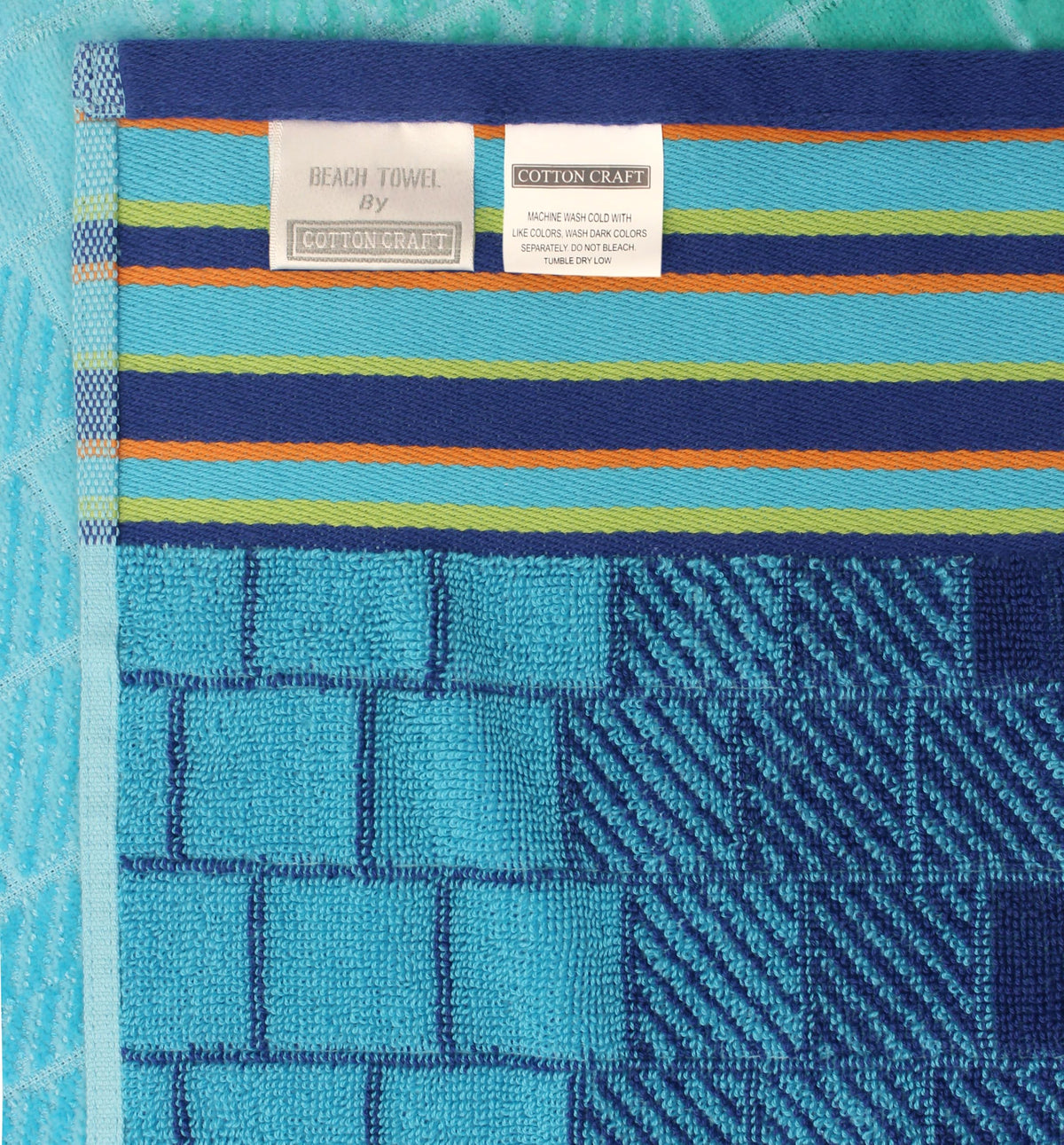 Cotton Craft soft high-pile towel ideal for poolside lounging.