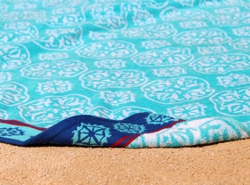 Cotton Craft two-towel setup rolled together, ready for beach trips.