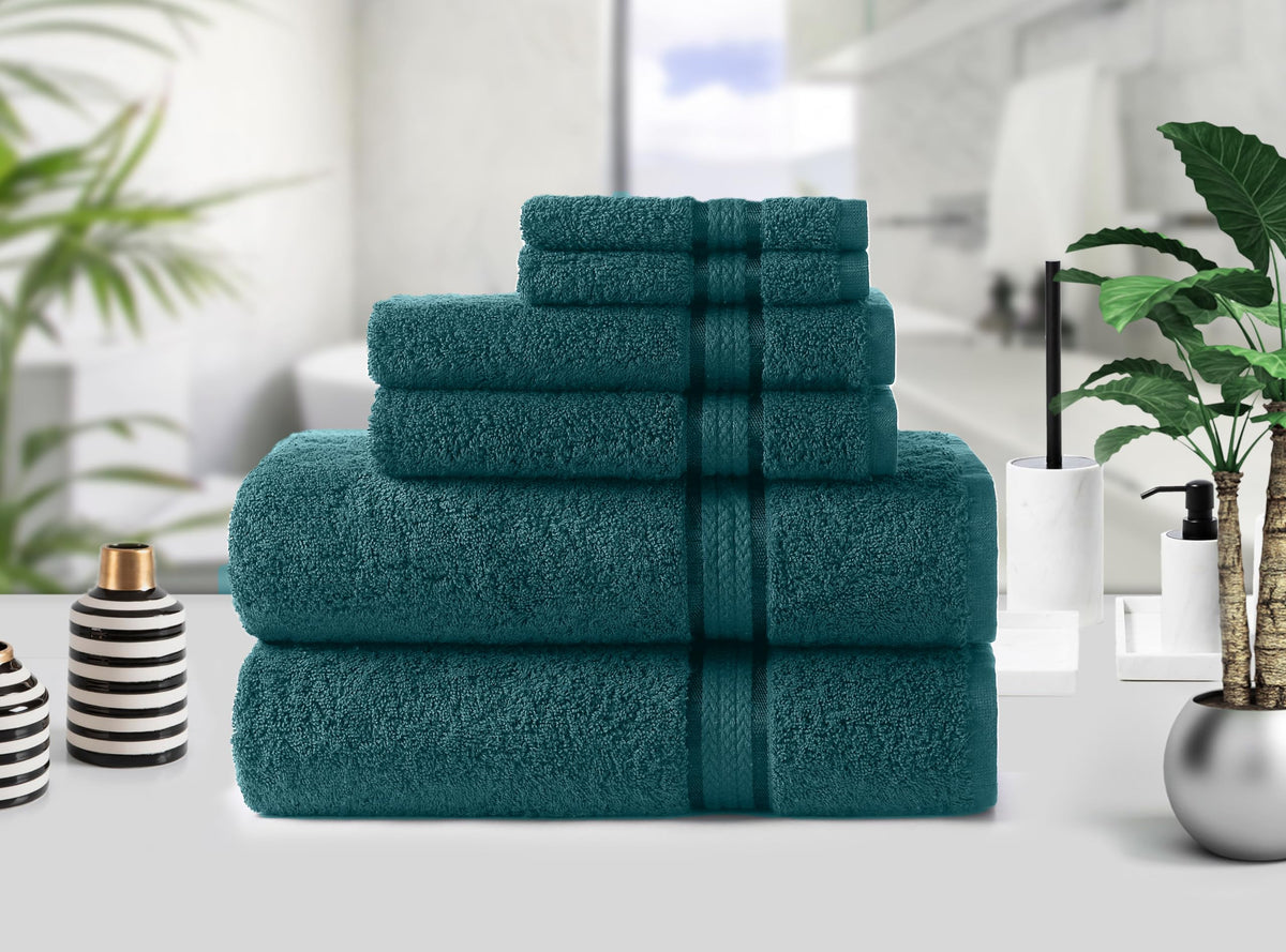COTTON CRAFT teal washcloths arranged for gentle cleansing