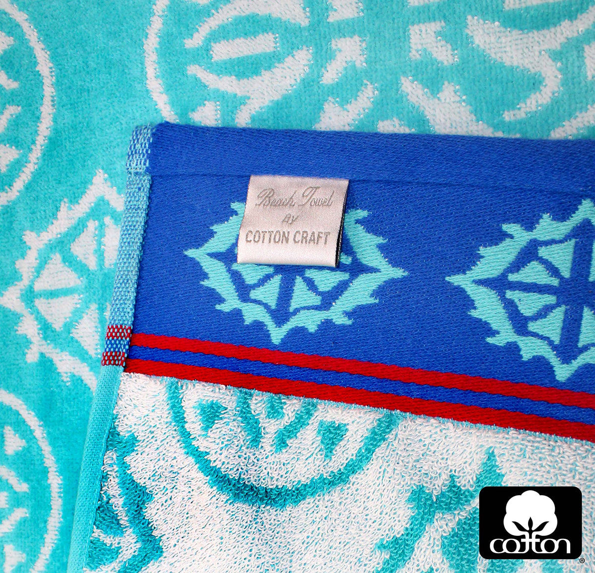 Cotton Craft velour towel close-up, 100% cotton and soft, absorbent for beach days.