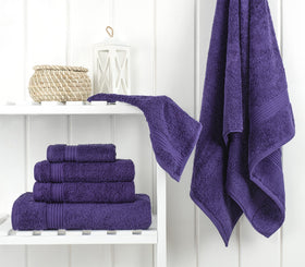 Cotton Paradise towel set contents with bath, hand, and washcloths arranged neatly.
