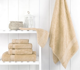 Cotton Paradise beige bath towels 27x54 showing size and plush absorbency