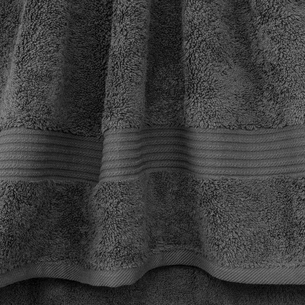 Cotton Paradise towels showcase quick-dry performance ideal after showers and swims.