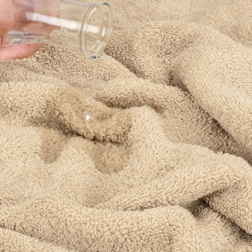 Cotton Paradise beige towels with double-stitched hems for durability