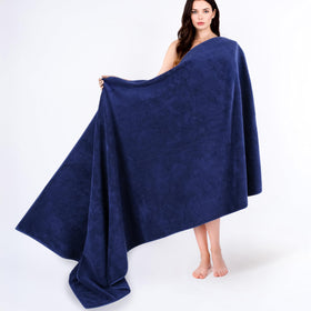 Cotton Paradise navy blue oversized bath towel folded, soft and absorbent for daily use.