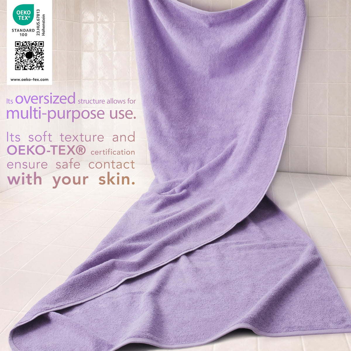 Cotton Paradise oversized towel in lilac on a rack