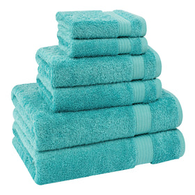 Cotton Paradise turquoise folded display in a modern bathroom for guests.
