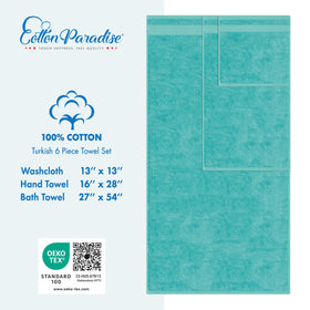 Cotton Paradise turquoise towel stack framed to highlight cohesive bathroom styling.