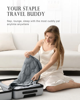 Rollable Cottonblue blanket ready for on-the-go relaxation.