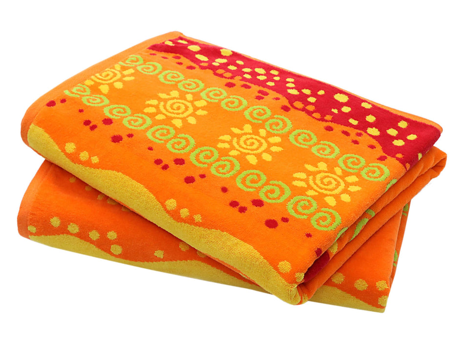 Cotton Craft oversized beach towel in sunshine-orange; spacious wrap for beach or poolside lounging.