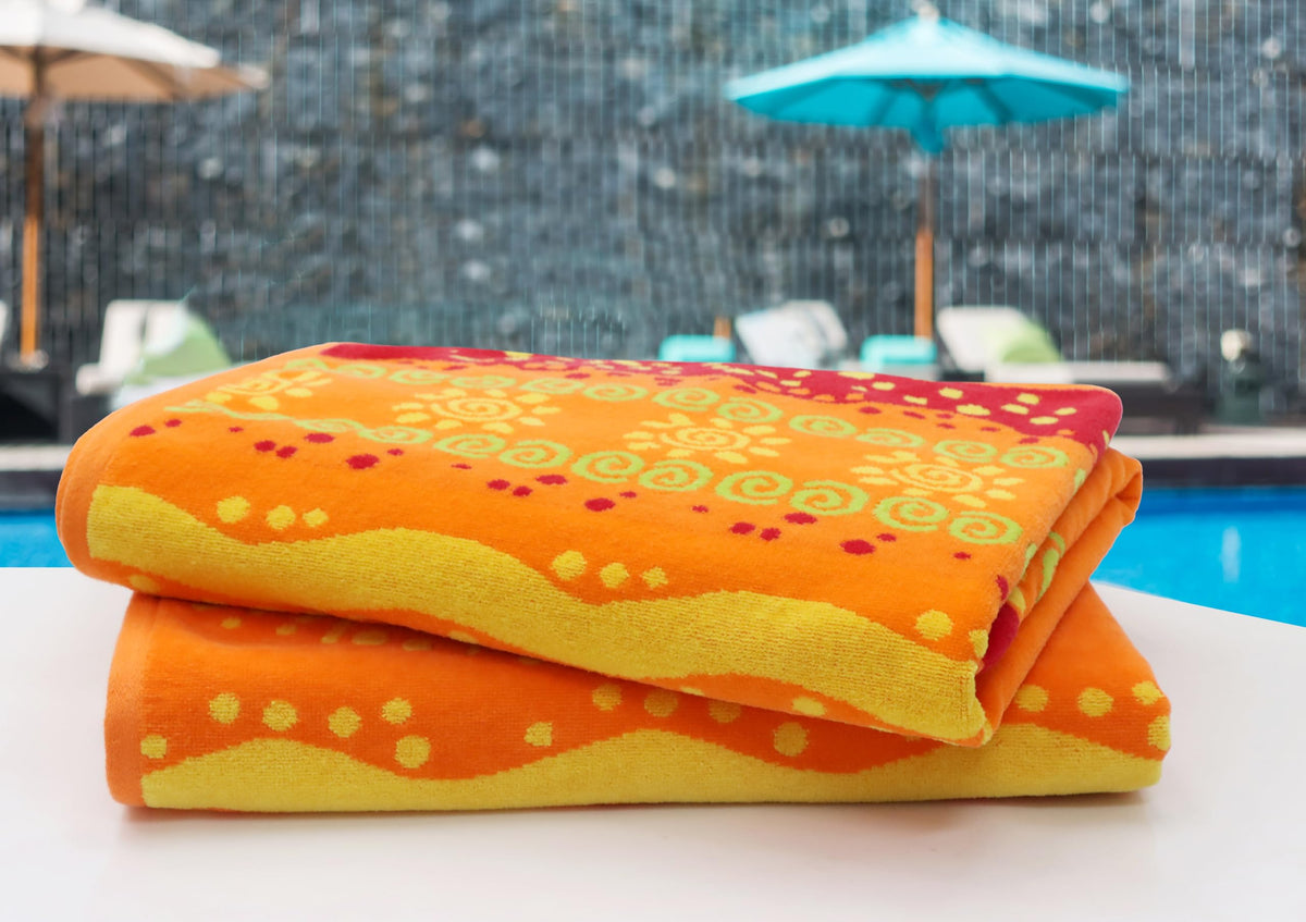 Cotton Craft plush terry towel; 450gsm; extra-soft, quick-absorbent for sunny days.