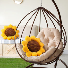 Coume yellow flower-seat cushion for chairs offers soft support and decorative appeal.