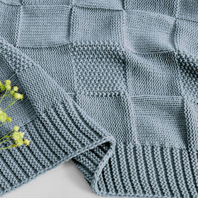 CozeCube 50x60 blanket works on couches and beds for versatile lounging.