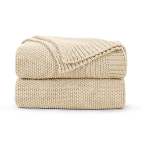 CozeCube beige throw knit close-up highlights soft acrylic texture and warmth