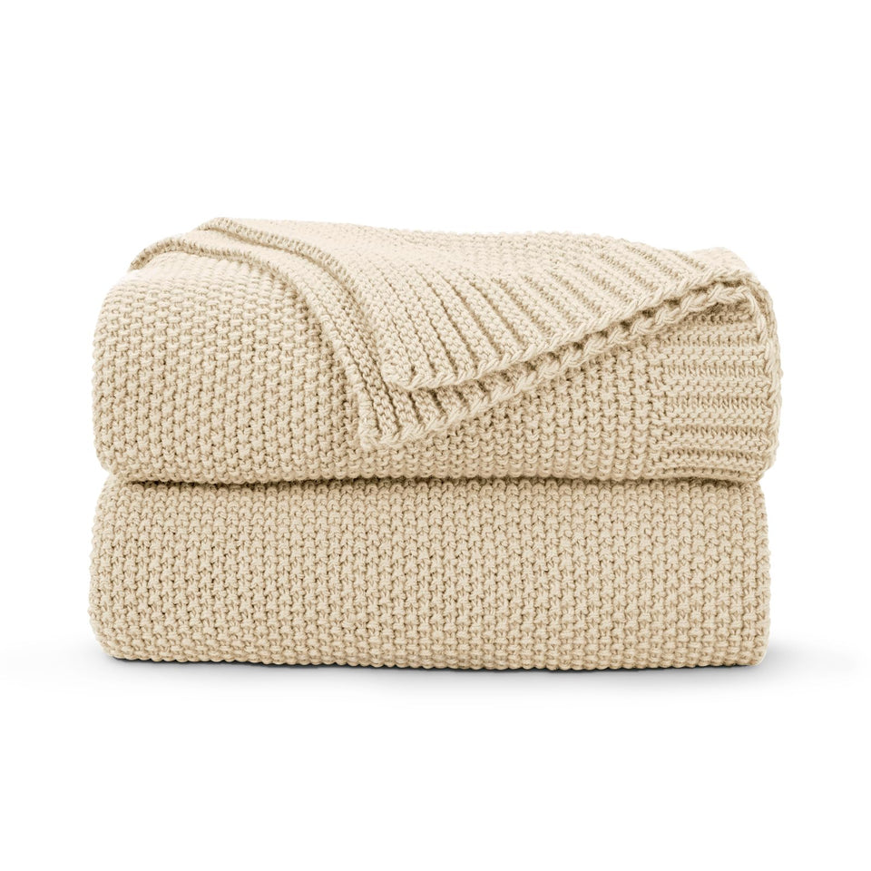 CozeCube beige throw knit close-up highlights soft acrylic texture and warmth