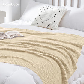 CozeCube beige throw on outdoor patio use for cool evenings