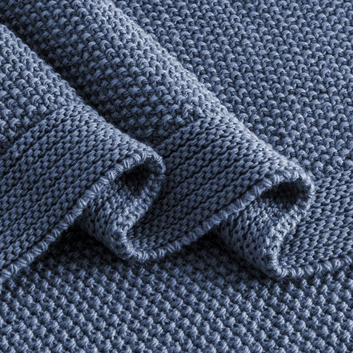 CozeCube blue knit throw shown as a perfect cuddle companion.