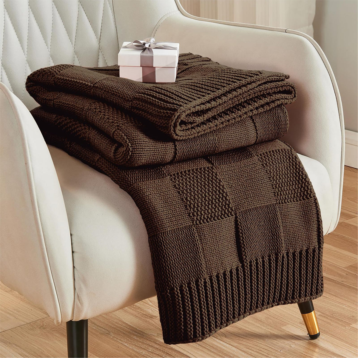 CozeCube check-knit throw dark brown on couch, providing cozy warmth for chilly evenings