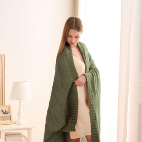 Seed-stitch detail close-up highlights textured warmth and classic style.