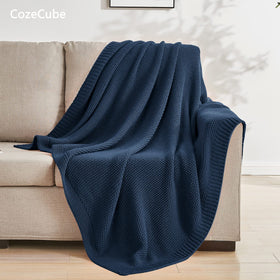 CozeCube navy blue knit closeup highlights breathable acrylic yarn for year-round comfort.
