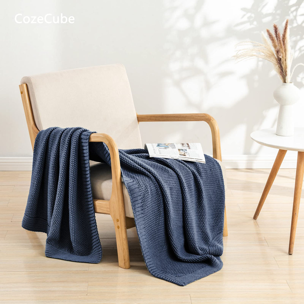 CozeCube seed-stitch knit close-up highlights soft, breathable acrylic texture.