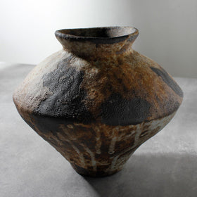 COZLIV Rusty Ceramic Vase centerpiece with rugged texture for warm table displays.
