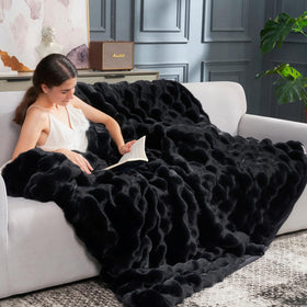 Cozy Bliss Bubble Blanket back view with silky micromink interior for cozy evenings