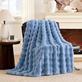 Cozy Bliss Bubble Throw in Misty Blue on sofa for cozy warmth