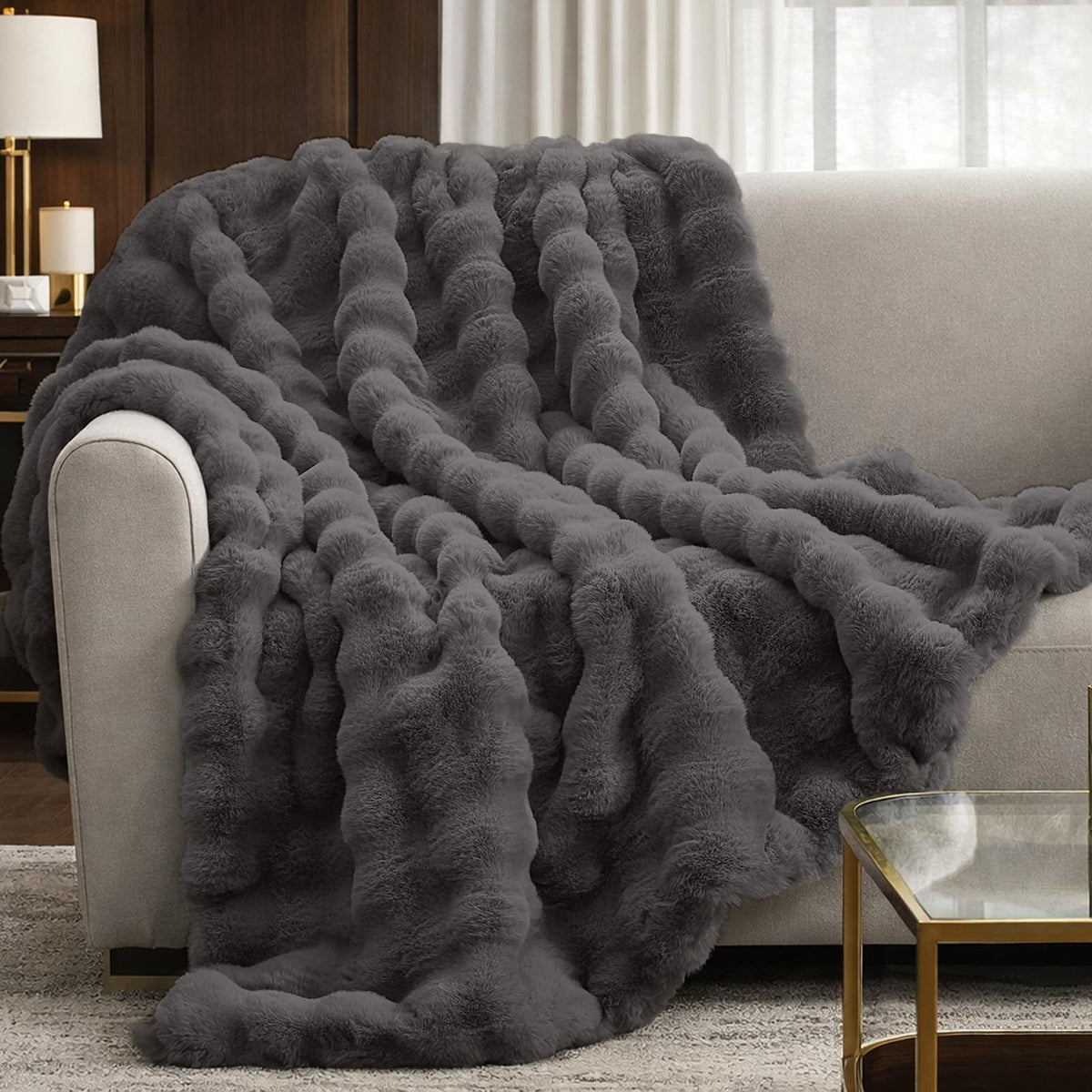 Cozy Bliss Bubble Throw on sofa adds warmth and style.
