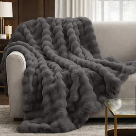 Cozy Bliss Bubble Throw on sofa adds warmth and style.
