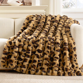 Cozy Bliss cheetah faux fur throw on sofa for cozy lounging