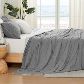 Cozy Bliss cooling comforter on bed reveals 3D hollow structure.