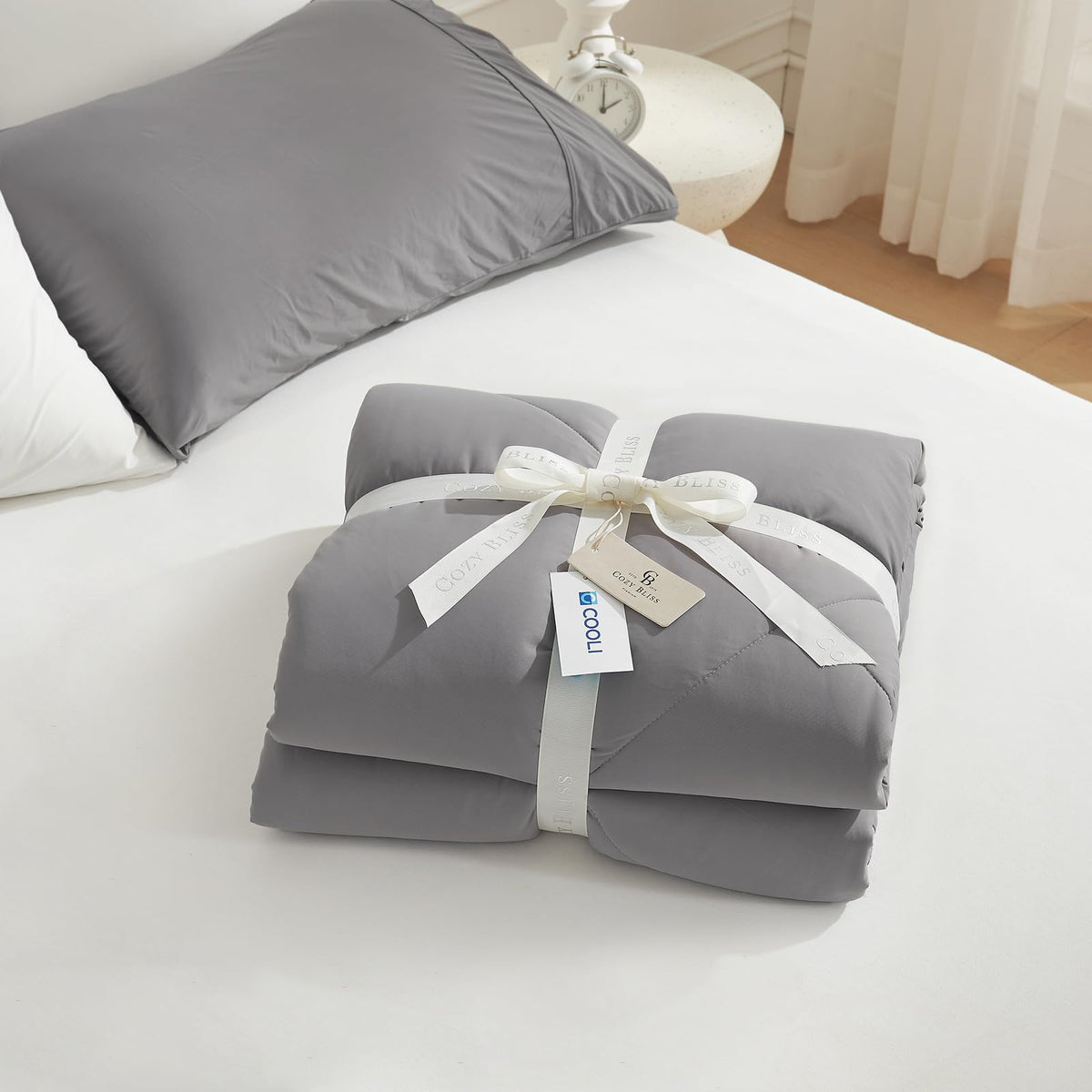 Cozy Bliss cooling comforter shows generous king-size dimensions.