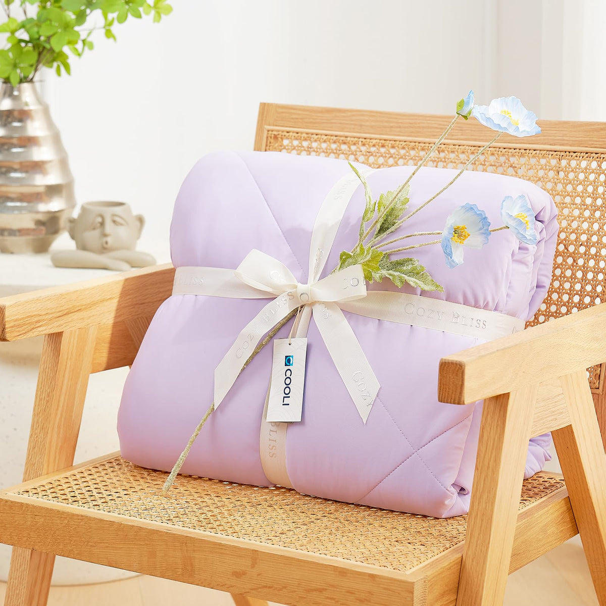 Cozy Bliss Cooling Comforter fabric closeup shows OEKO-TEX fabric and plush feel.