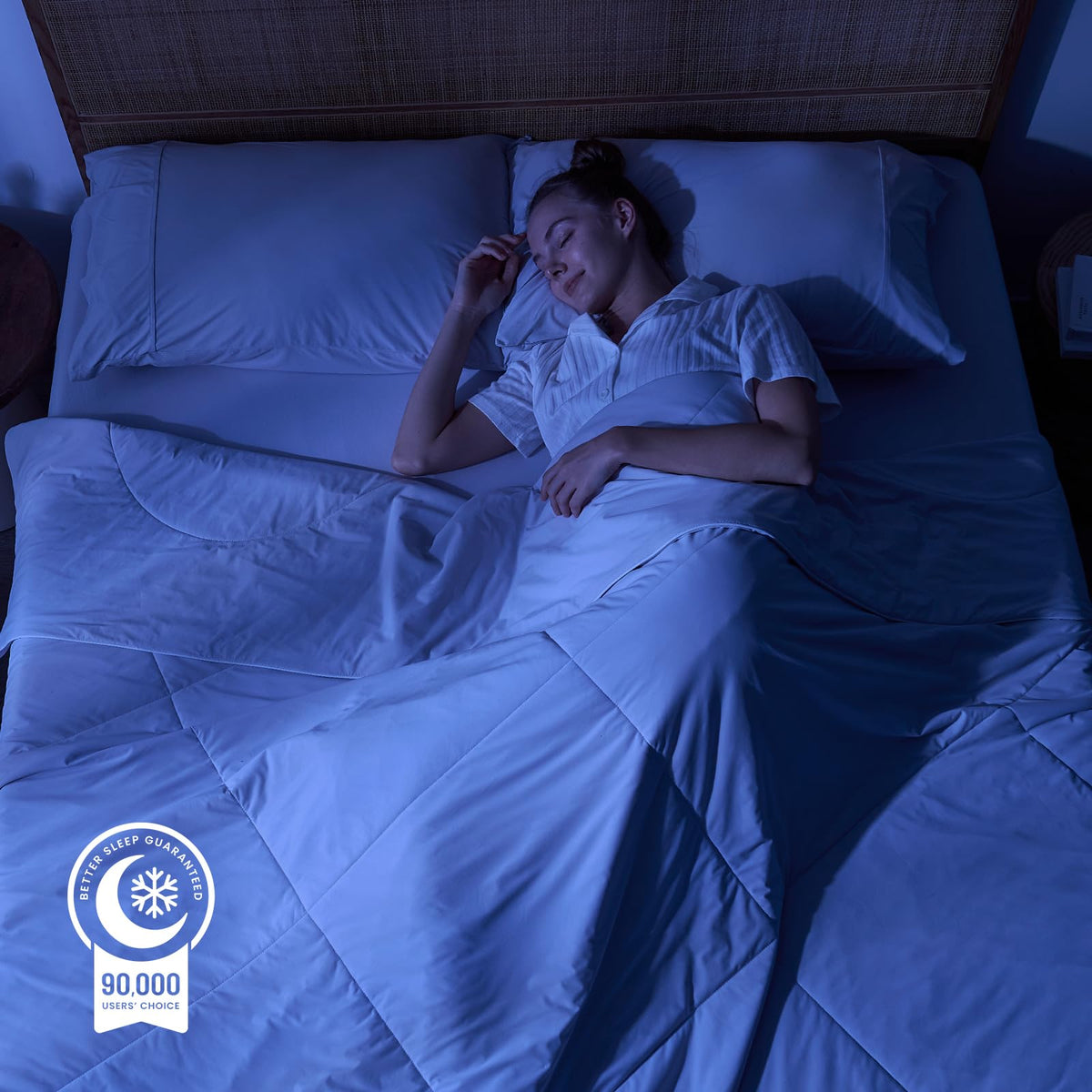Cozy Bliss cooling comforter folded, highlighting lightweight summer design.