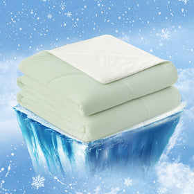 Cozy Bliss cooling comforter on bed keeps hot sleepers cool.