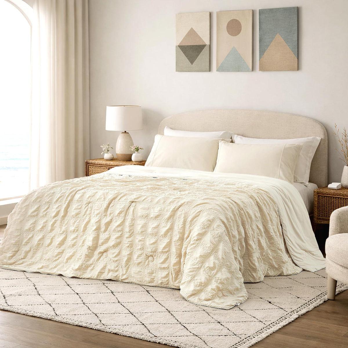 Cozy Bliss cooling comforter with seersucker plaid on queen bed for cooler nights.