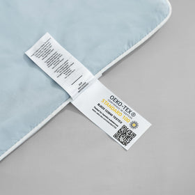 Cozy Bliss durable stitching and machine-washable design demonstrated.