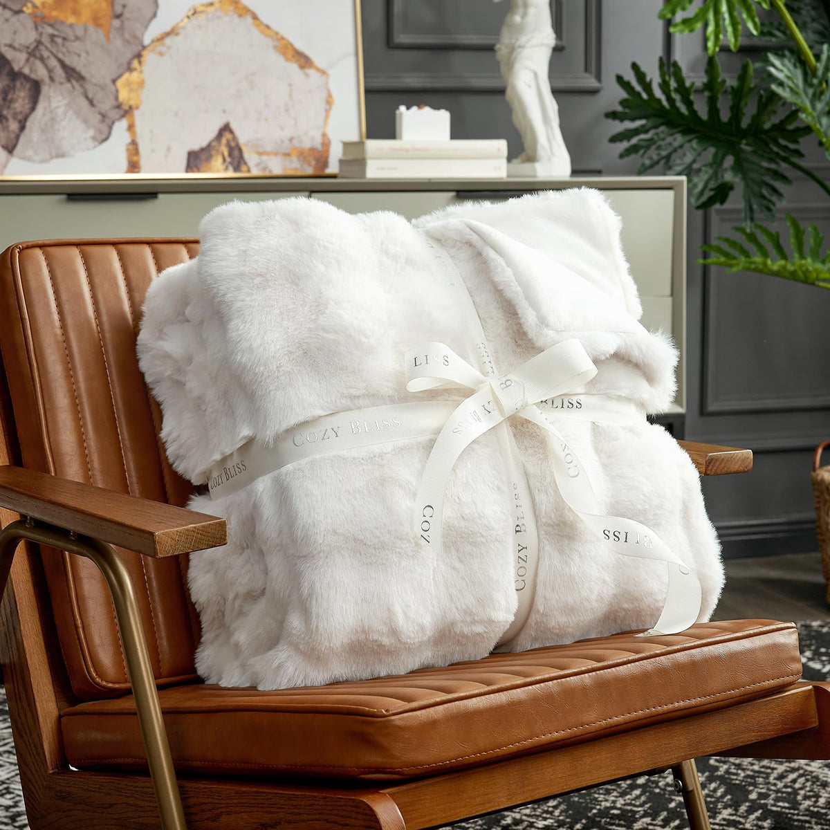 Cozy Bliss faux fur face side blanket conveys luxury and warmth.