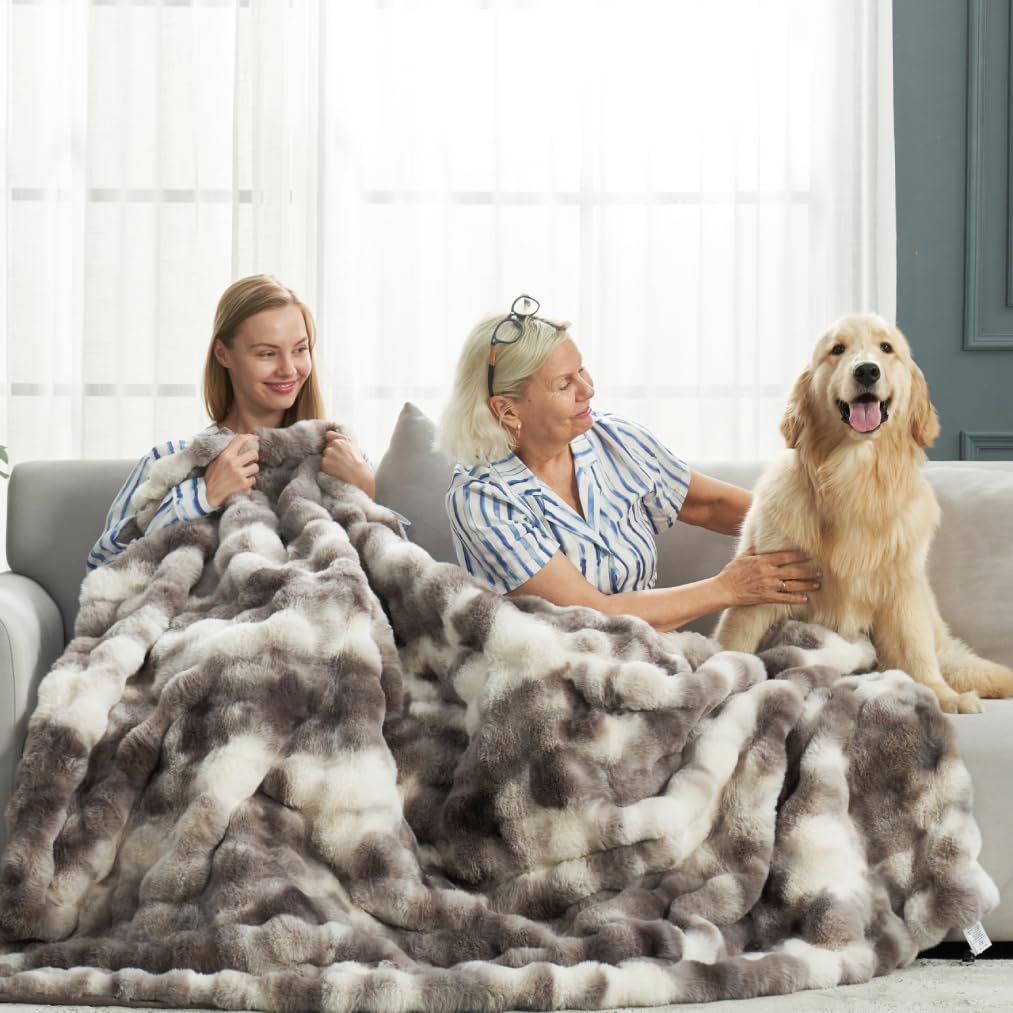 Cozy Bliss faux fur throw features 630gsm face for plush warmth.