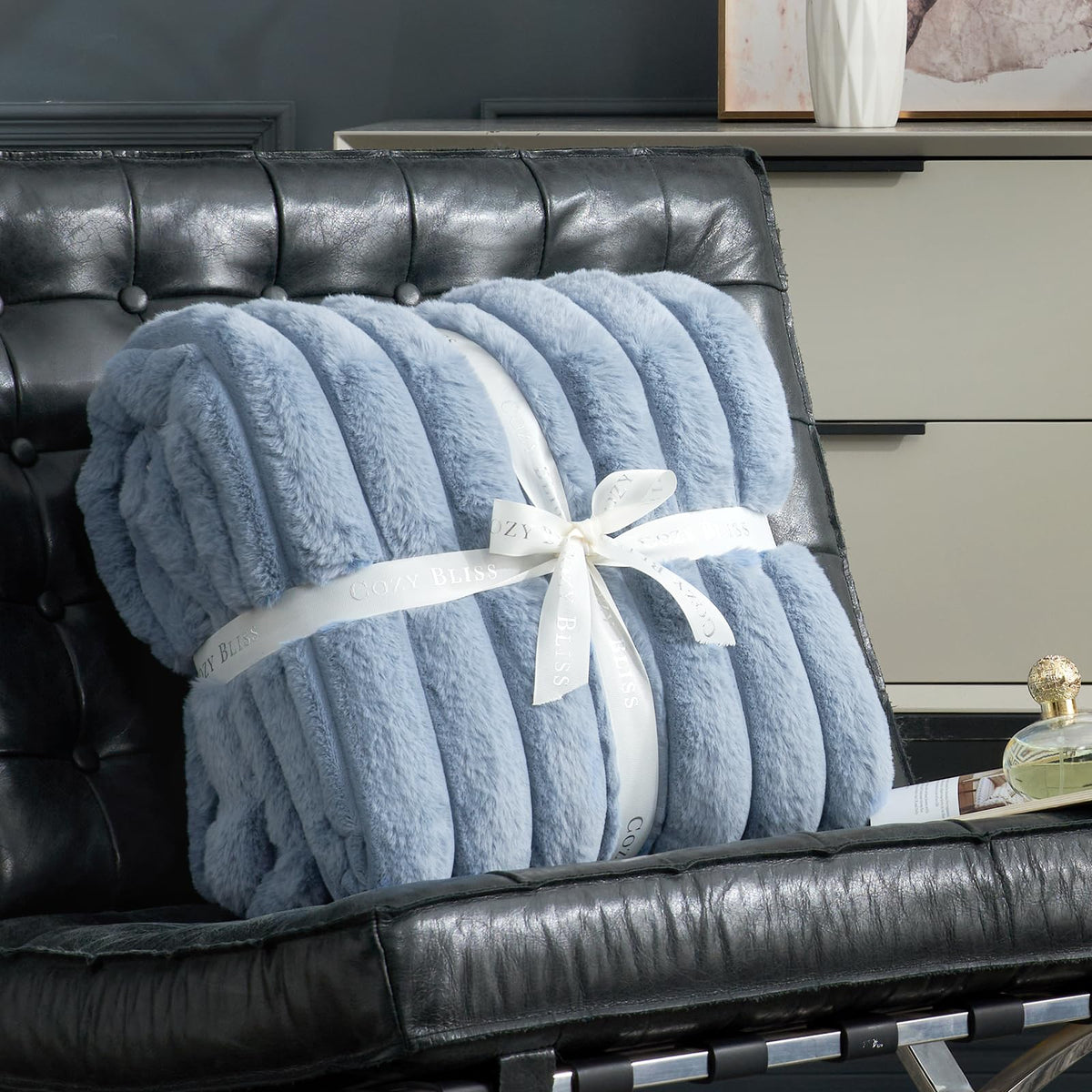 Cozy Bliss faux fur throw on bed enhances cozy bedroom ambiance